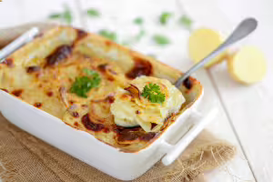 Potato and smoked ham gratin