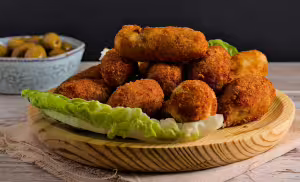 Potato croquettes with chipolata